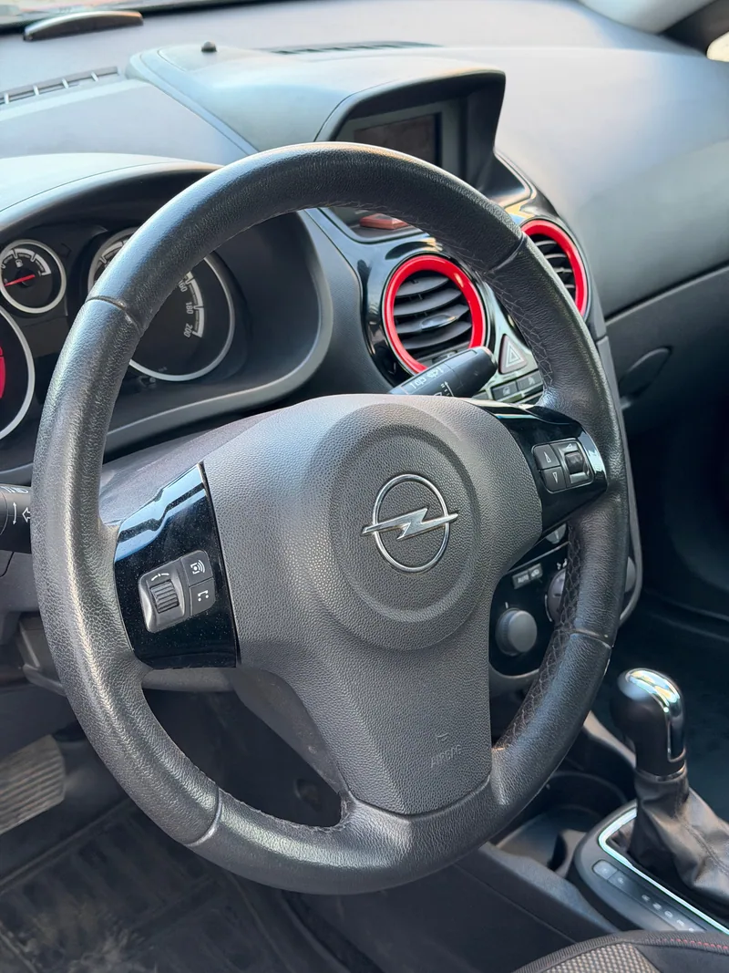 Opel Corsa 2013 — купить в автосалоне «Алмаз Авто», ст. Динская — фото 12